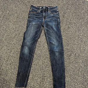 6 pair of American Eagle jeans